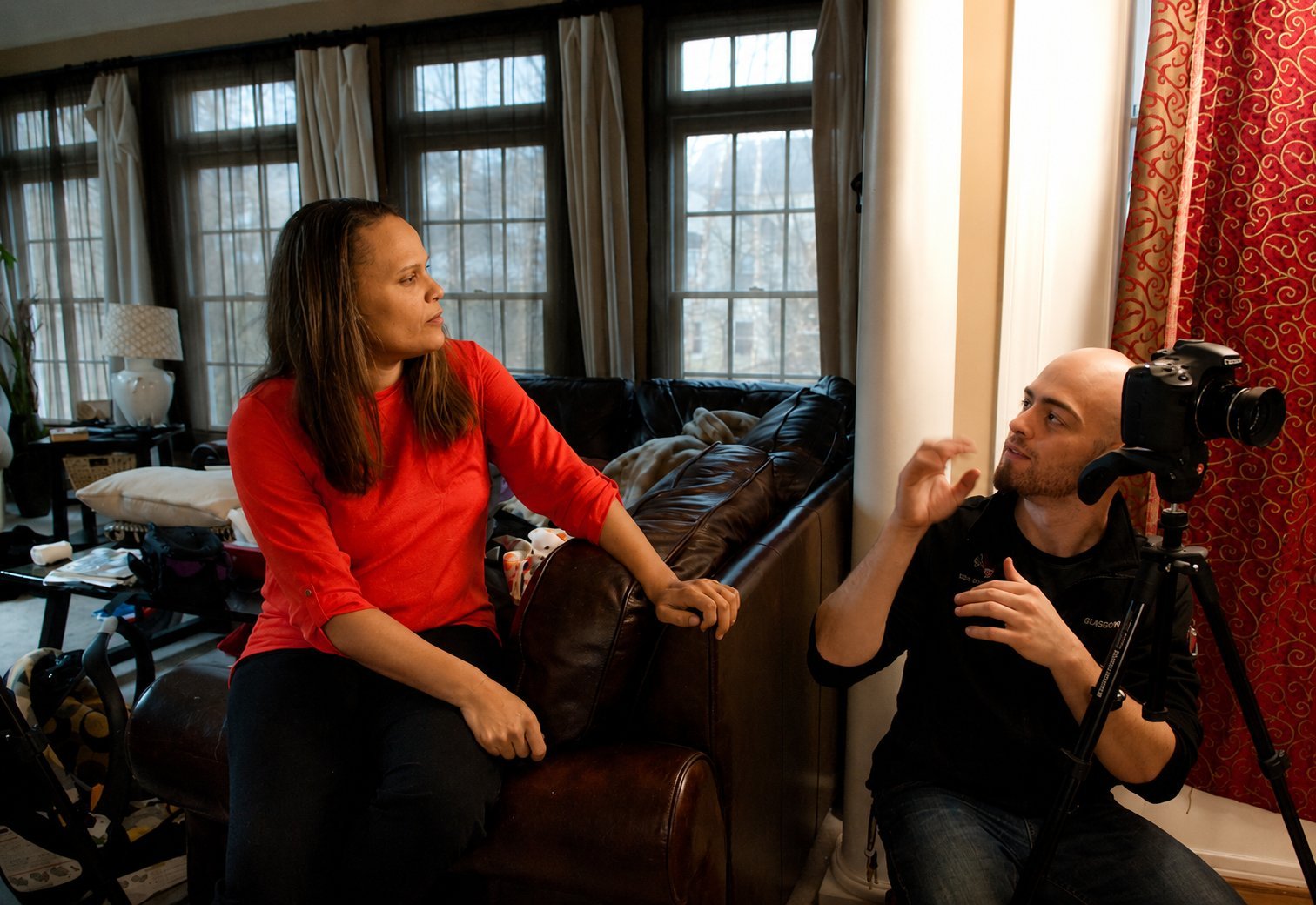 Rosa Lee Timm in conversation with a collaborator during a creative review session